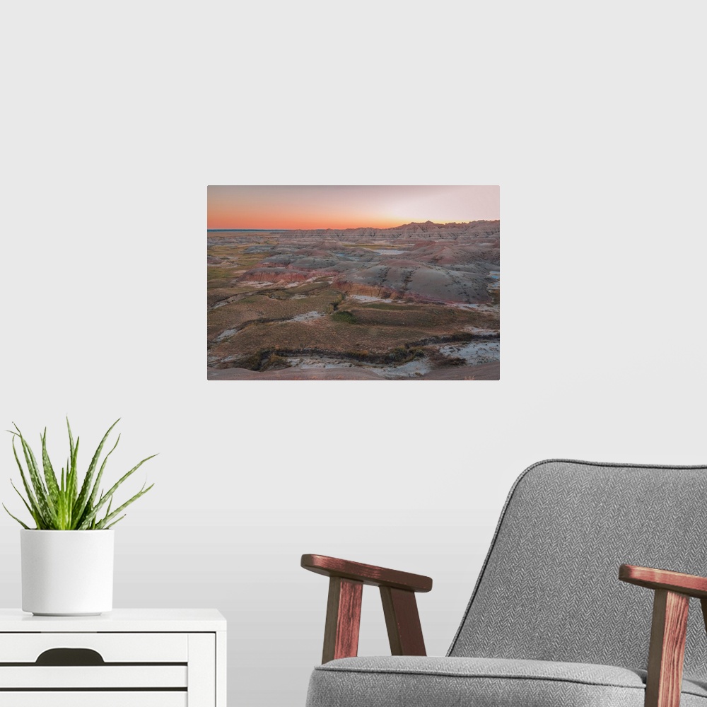 A modern room featuring Sunset over layered rock formation in Badlands National Park, South Dakota.