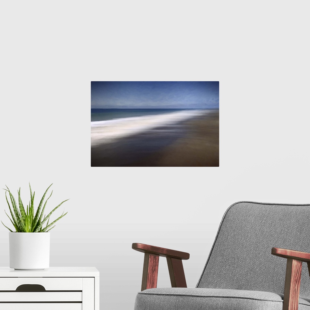 A modern room featuring Blurred long-exposure image of the foamy sea on a sandy beach, moving with the tide.