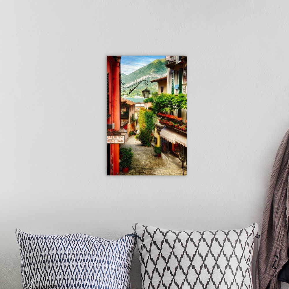 A bohemian room featuring Fine art photo of an alleyway between the shops in Como, Italy.