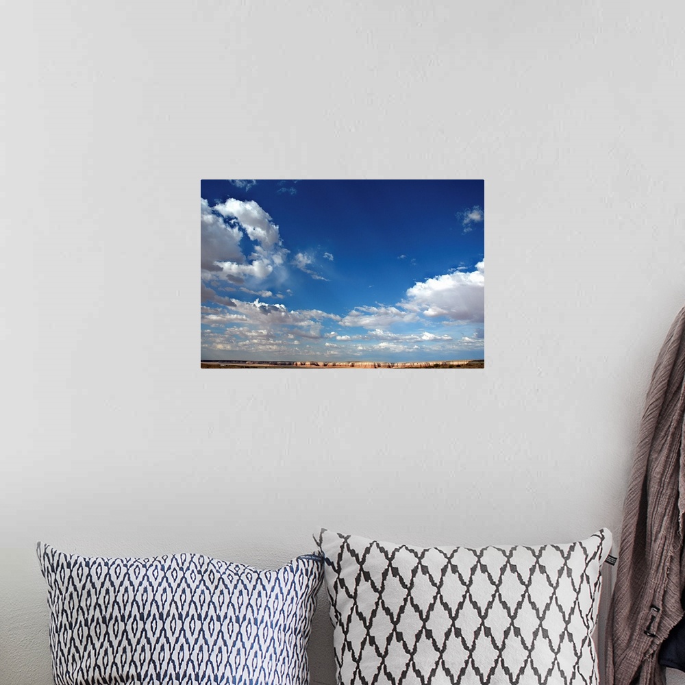 A bohemian room featuring Beautiful blue sky with heavy clouds