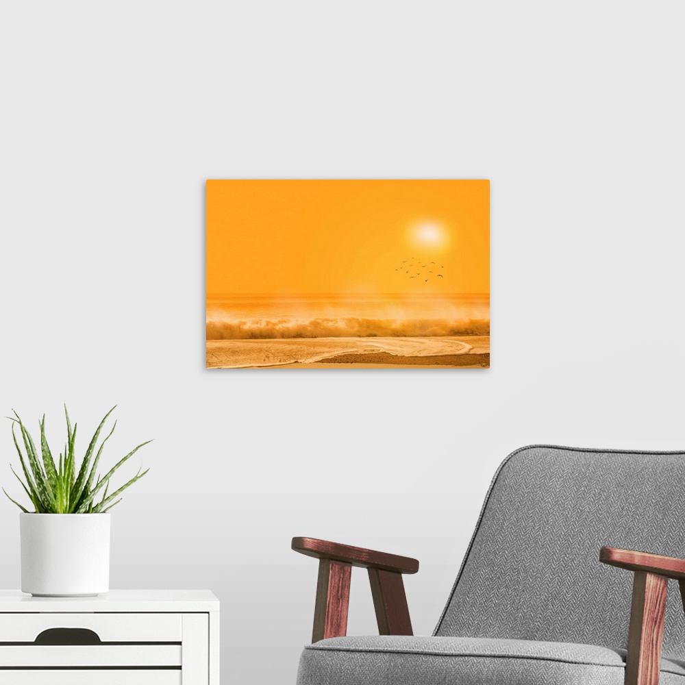 A modern room featuring A photograph of a beach scene under an orange sky.