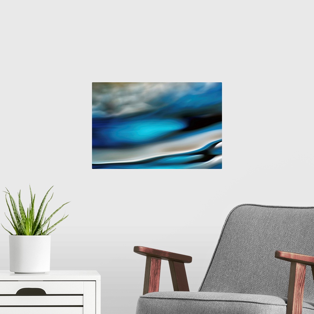 A modern room featuring Abstract photo of smooth waves in cool tones.