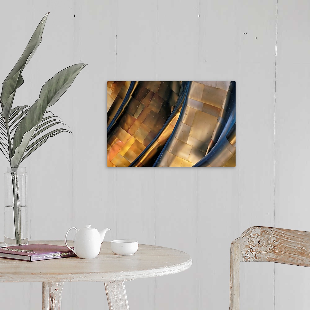 A farmhouse room featuring Abstract photograph of a large metal structure reflecting blue and gold light.