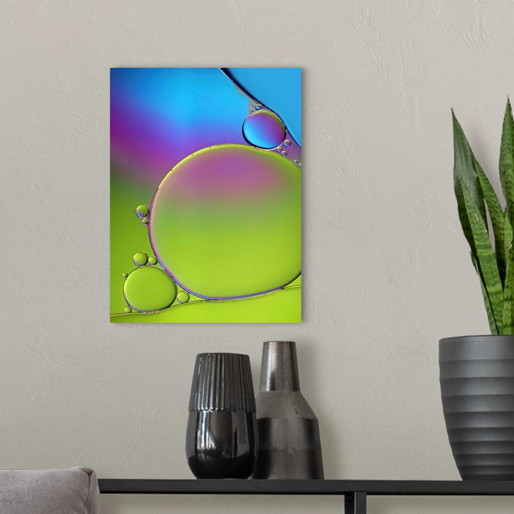 A modern room featuring A macro photograph of air bubbles illuminated by vibrant colors.