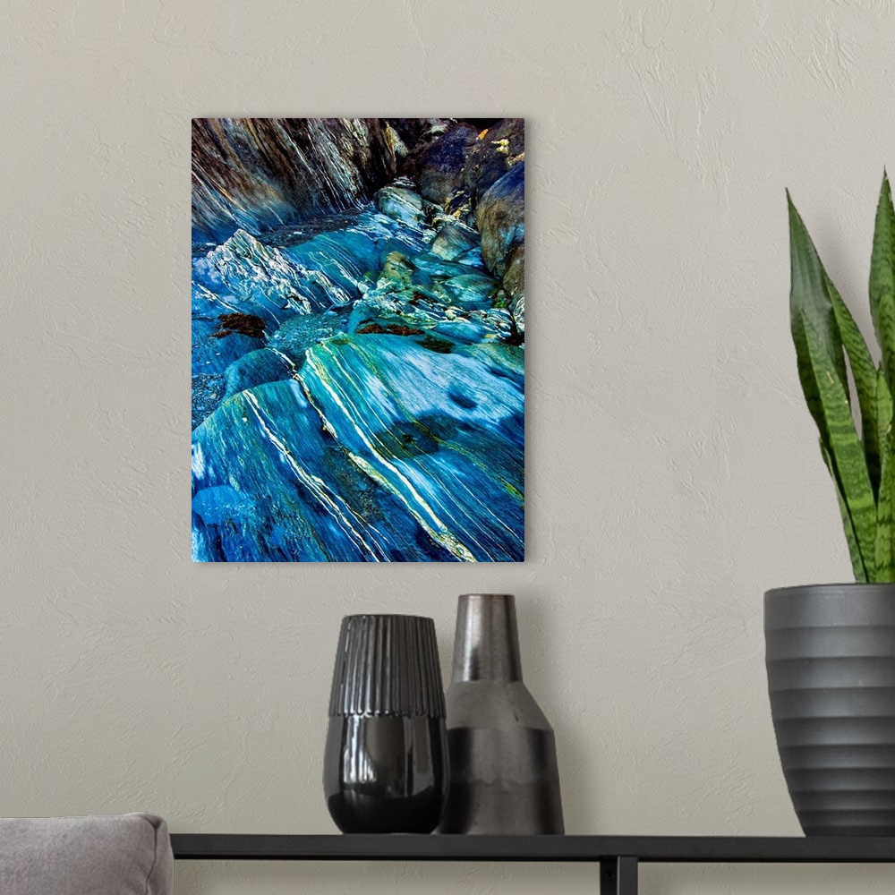 A modern room featuring Fine art photo of a turquoise stream flowing over a rocky riverbed.