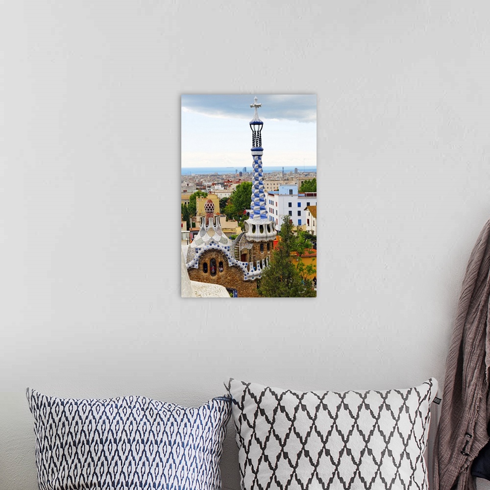 A bohemian room featuring High Angle View of the Gatehouse with White and Blue Tower, Park Guell