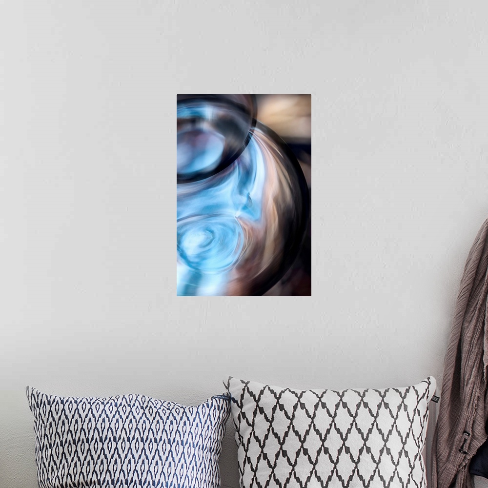 A bohemian room featuring Tall abstract photo on canvas of the up close of a vase.