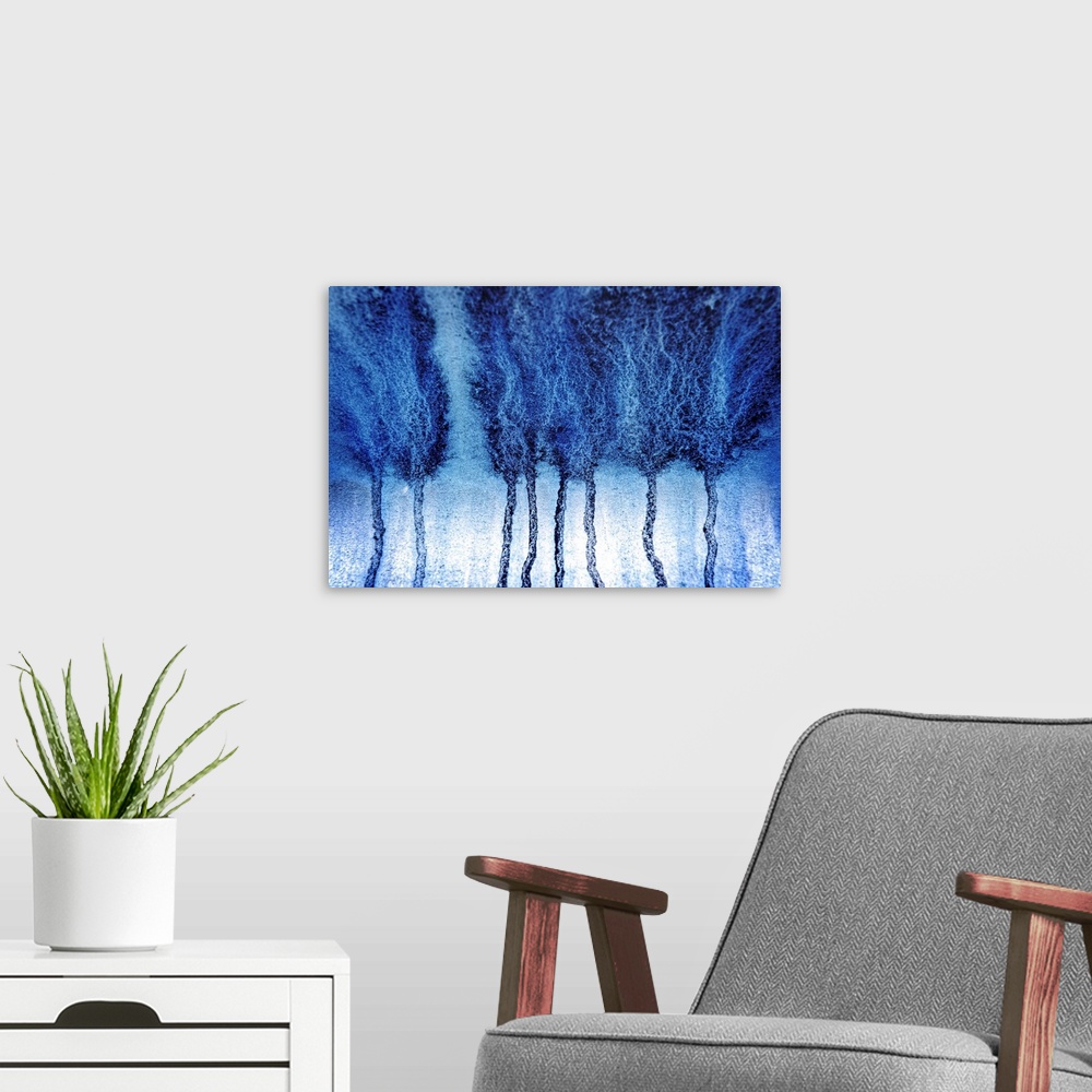 A modern room featuring Abstract artistic photograph of blue paint dripping down a surface.