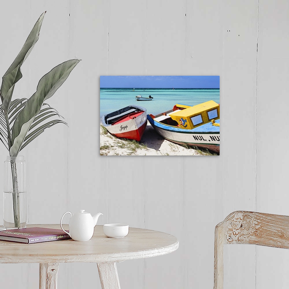 A farmhouse room featuring A photograph of colorful boats sitting on the shore of a tropical beach.