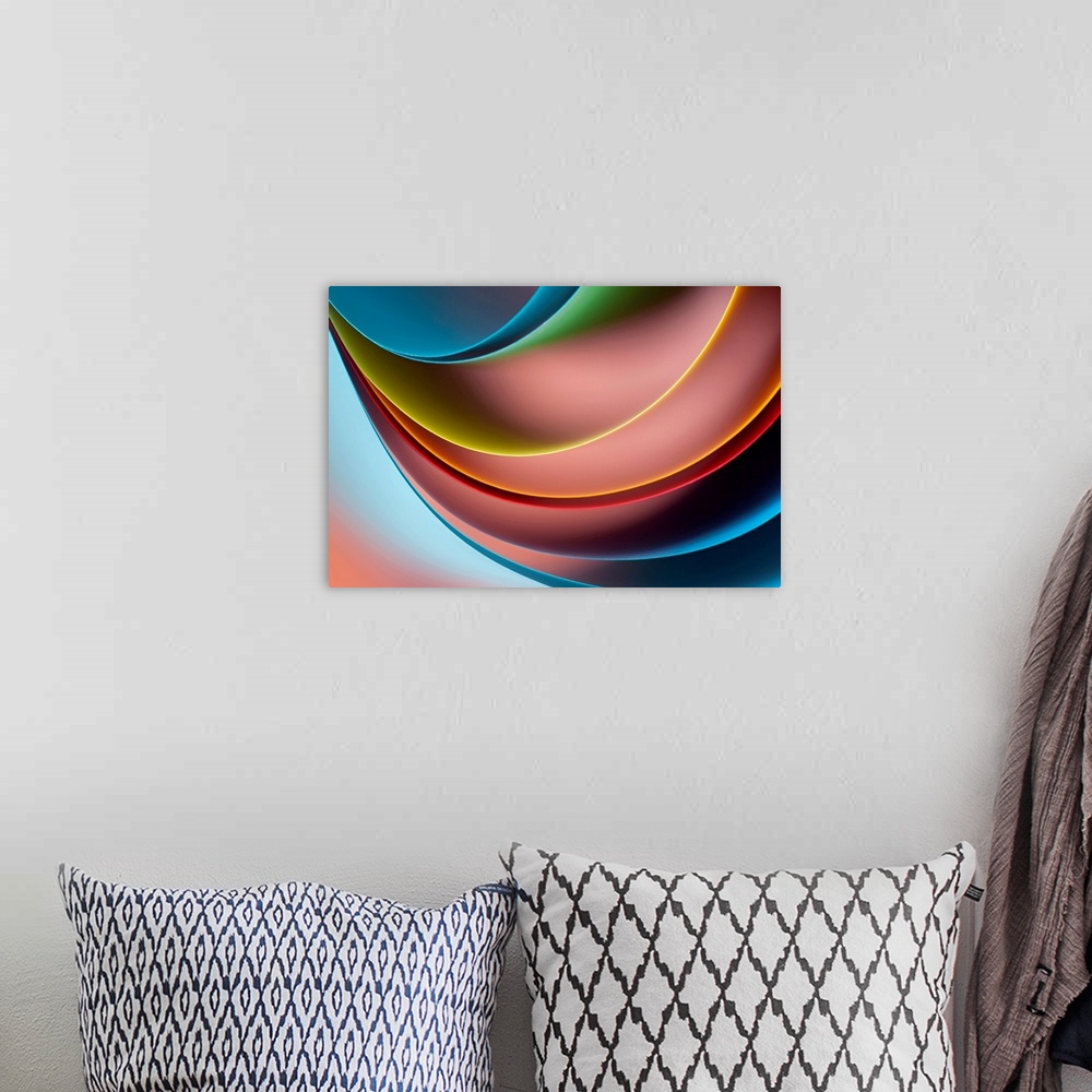 A bohemian room featuring Abstract artwork that uses several different curves of colors to give it a 3D appearance.