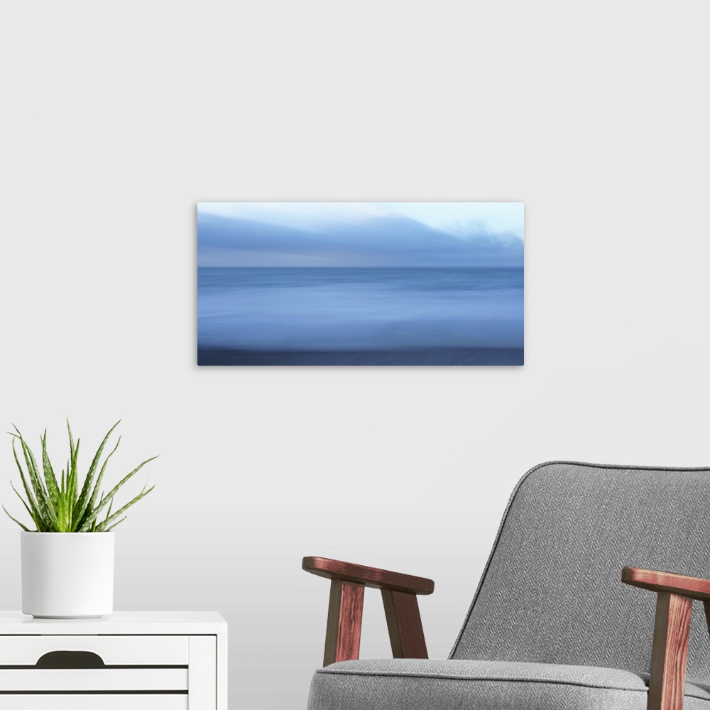 A modern room featuring Artistically blurred photo. Winter view on a windy day of the North Sea, North Jutland, Denmark.