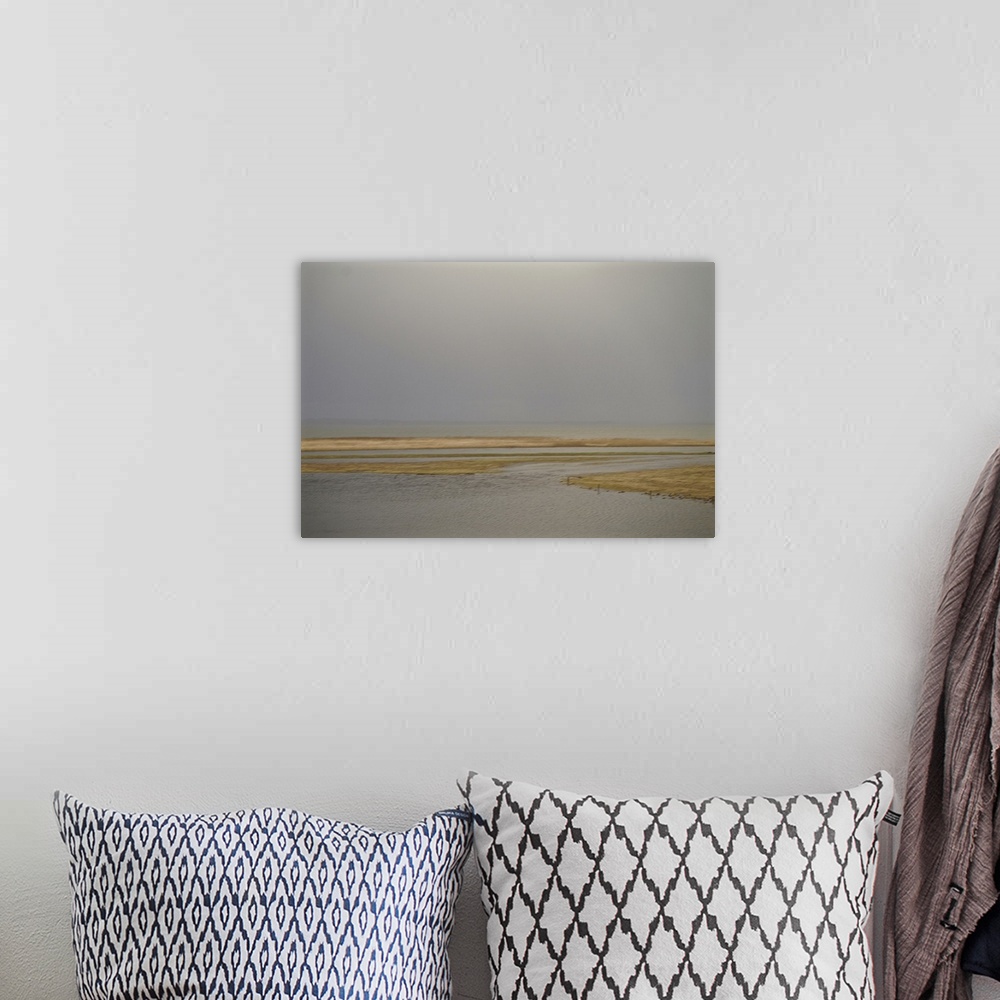 A bohemian room featuring Artistically blurred photo. Winter view on the lake Flade So in Denmark, late in the afternoon af...