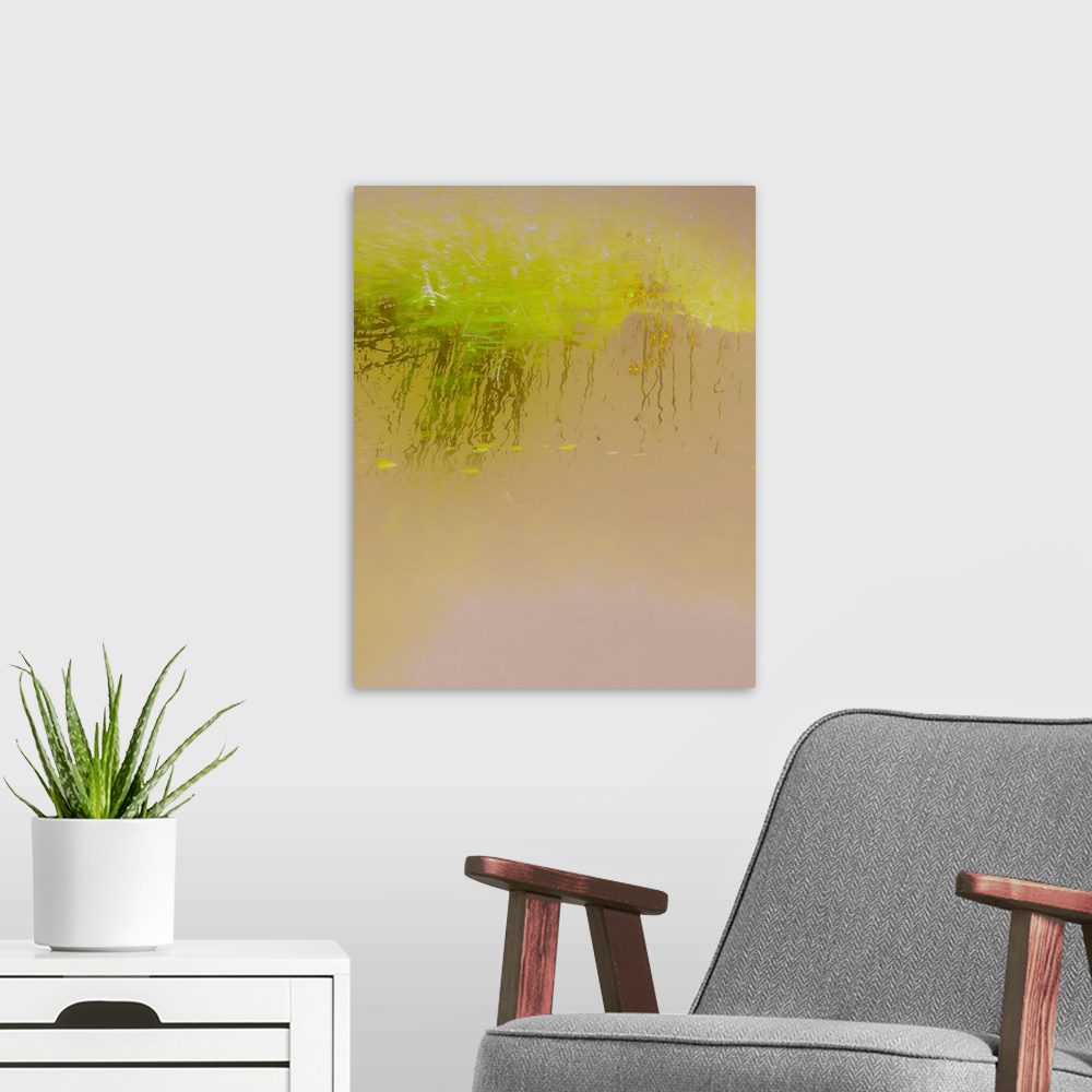 A modern room featuring Abstract photograph of bright green reeds reflecting into golden lit water.