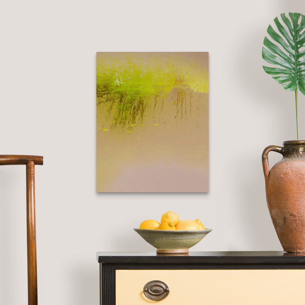 A traditional room featuring Abstract photograph of bright green reeds reflecting into golden lit water.