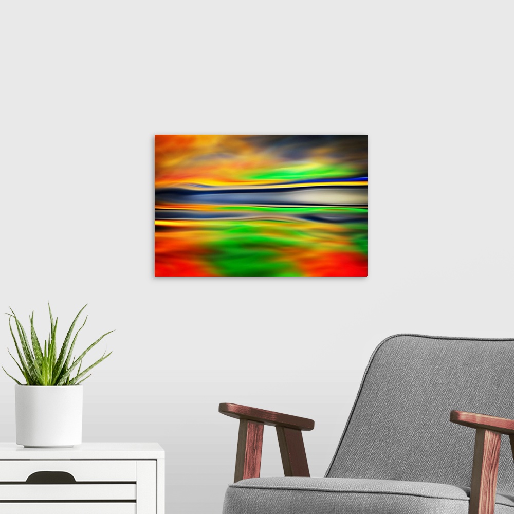 A modern room featuring Abstract artwork of flowing bright colors that have been blended to create subtle ripples.
