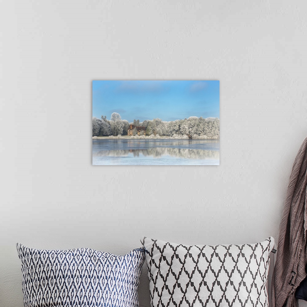 A bohemian room featuring Photograph of a view across the frozen pond from Broceliande Castle.