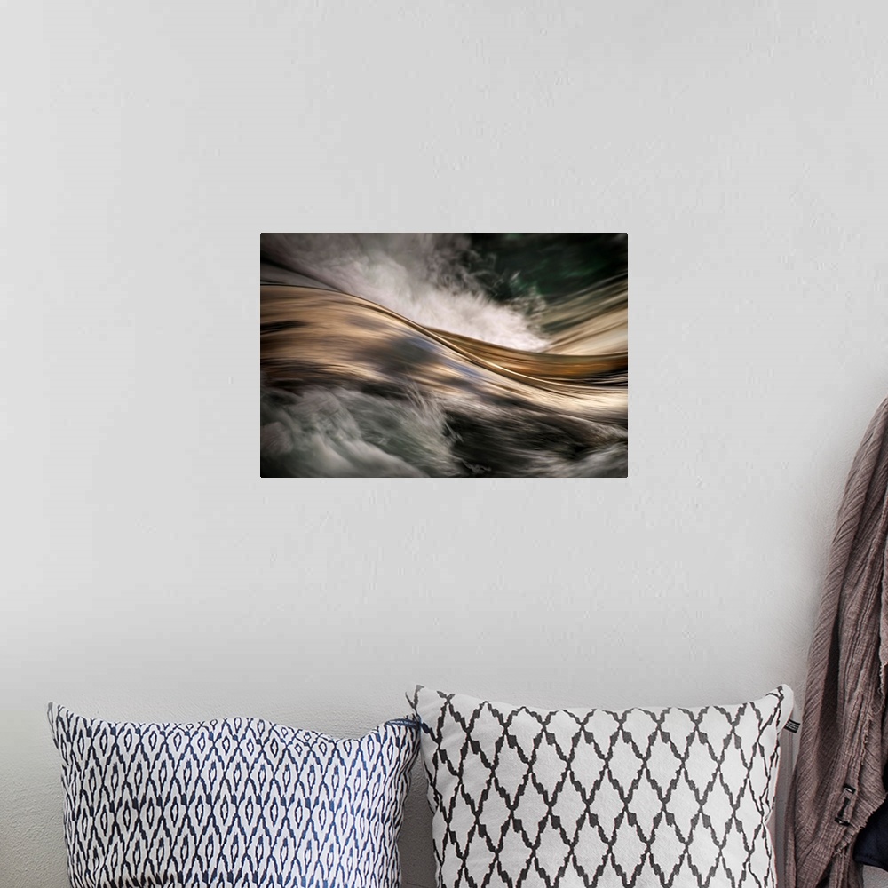 A bohemian room featuring An abstract photograph of a detail from water rapids.