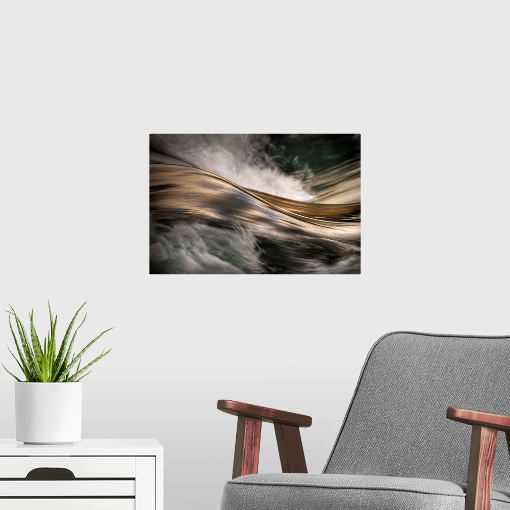 A modern room featuring An abstract photograph of a detail from water rapids.