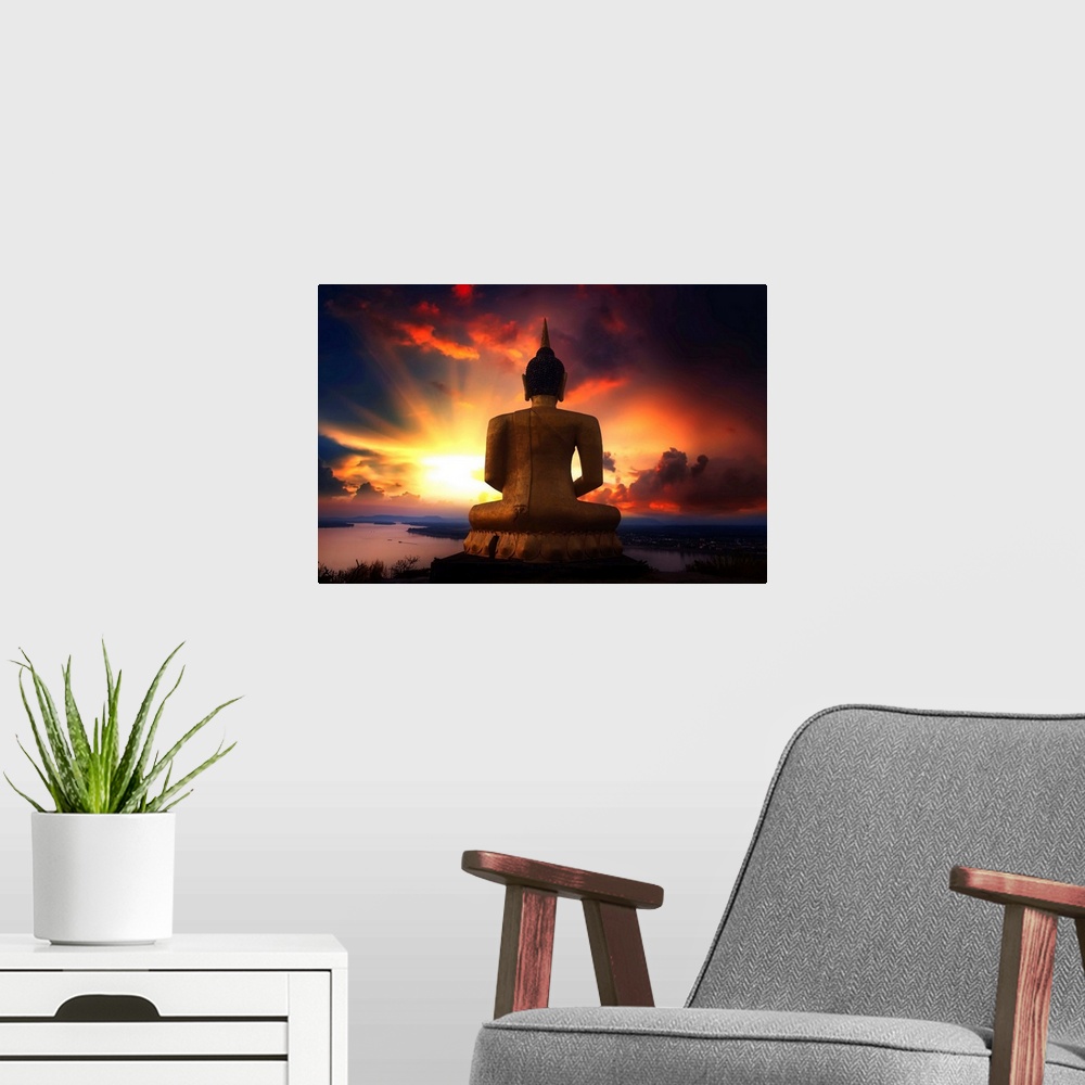 A modern room featuring Buddha facing the sunset
