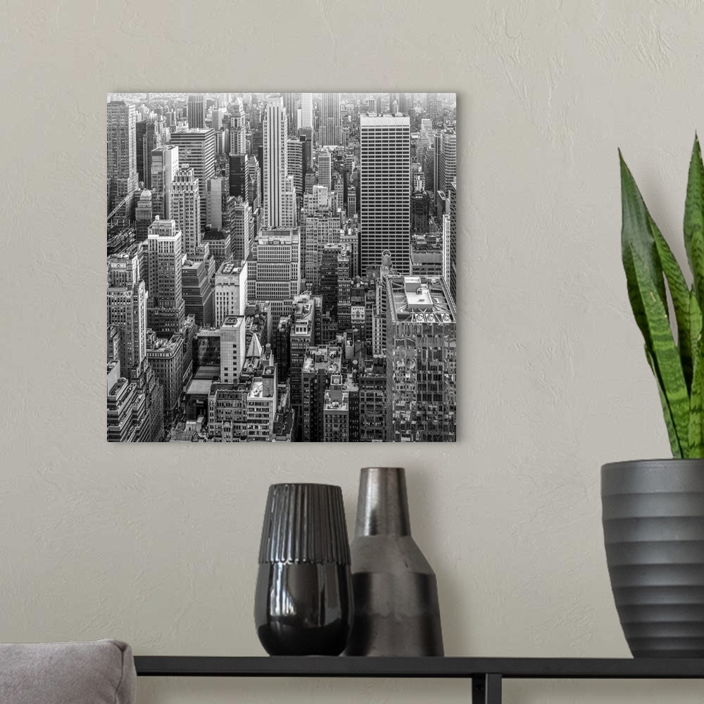 A modern room featuring A glimpse of the skyscrapers of New York in black and white to give the image a dramatic flair.
