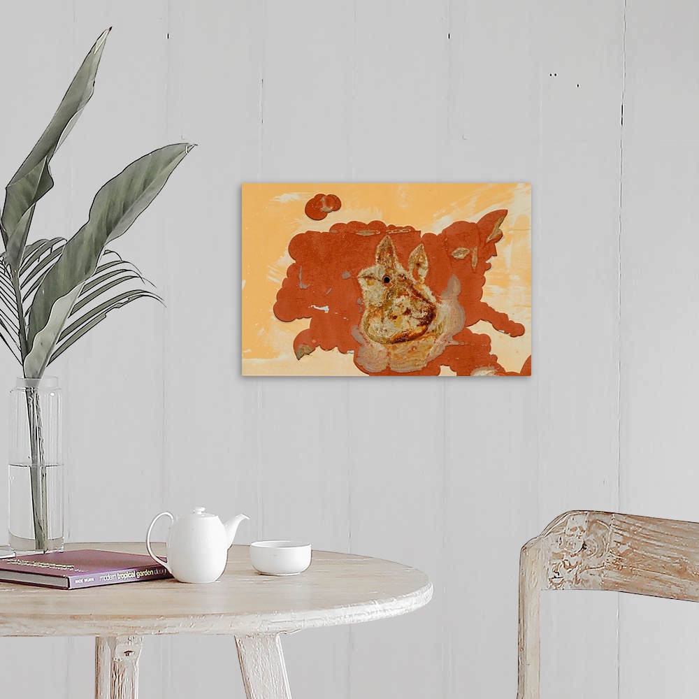 A farmhouse room featuring A rust-colored spill with the shape of an abstract rabbit.