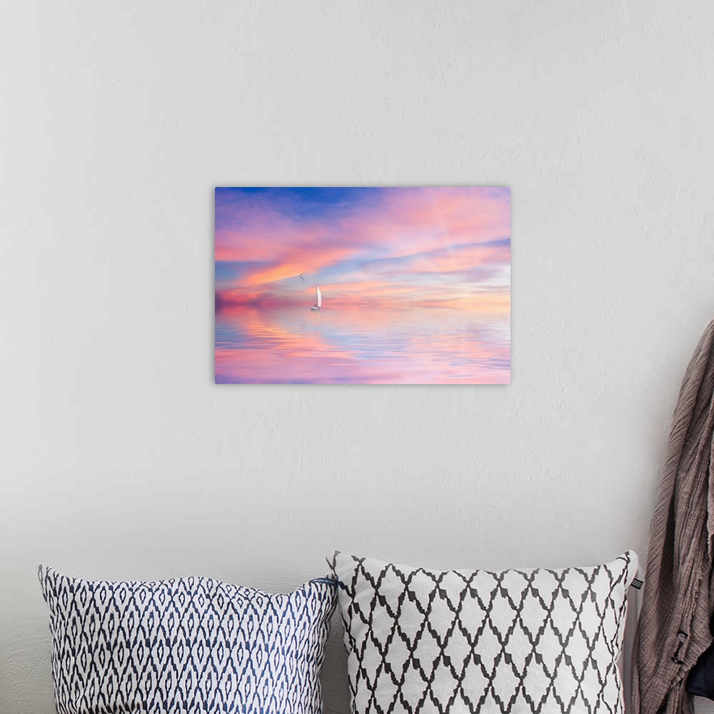A bohemian room featuring Sunset with a pastel sky and a boat