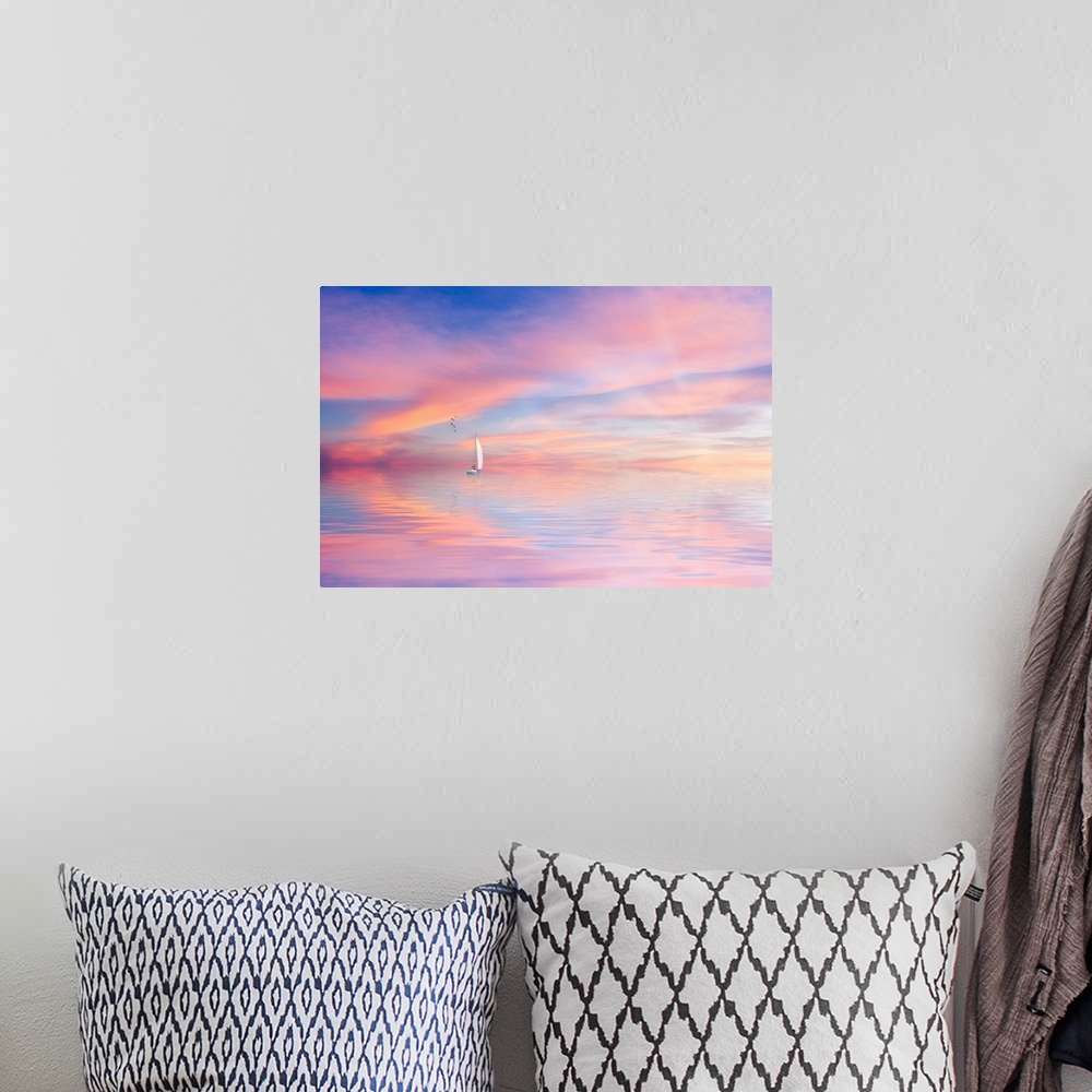 A bohemian room featuring Sunset with a pastel sky and a boat