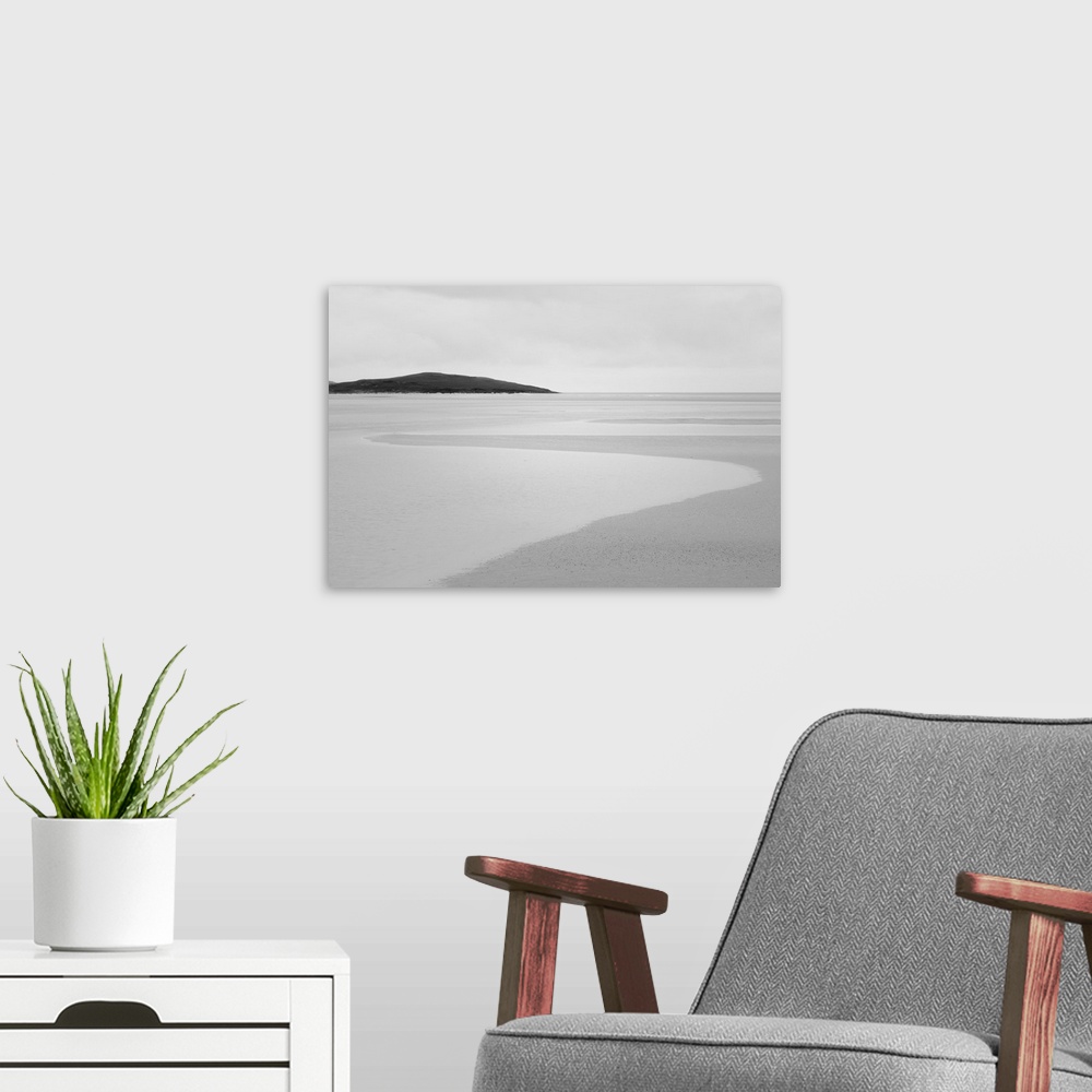 A modern room featuring Black and white photograph of Luskentyre sands in Scotland.