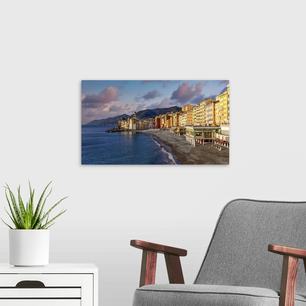 A modern room featuring Camogli is a seaside village known for its small port and colorful buildings on the seafront. It ...