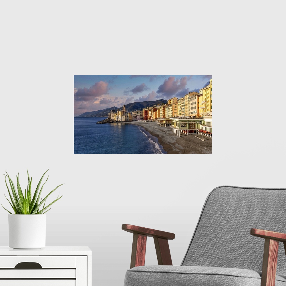 A modern room featuring Camogli is a seaside village known for its small port and colorful buildings on the seafront. It ...
