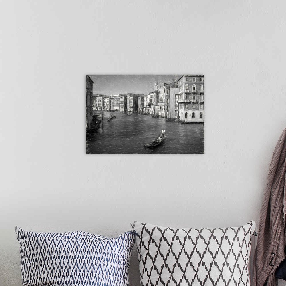 A bohemian room featuring Fine art photo of a gondola in a canal in Venice, in black and white.