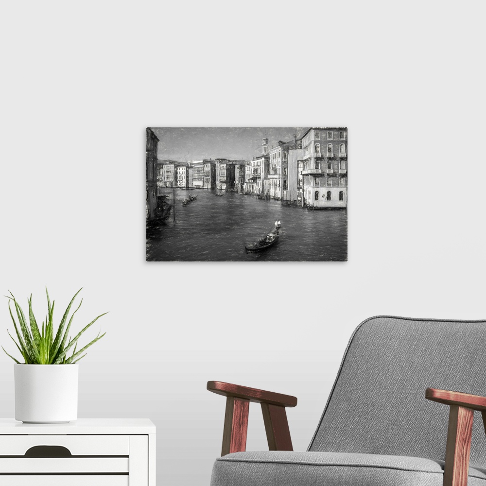 A modern room featuring Fine art photo of a gondola in a canal in Venice, in black and white.