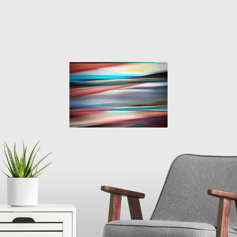 A modern room featuring Abstract image of a group of colourful canoes on a beached for the Winter close to a lake in Brit...