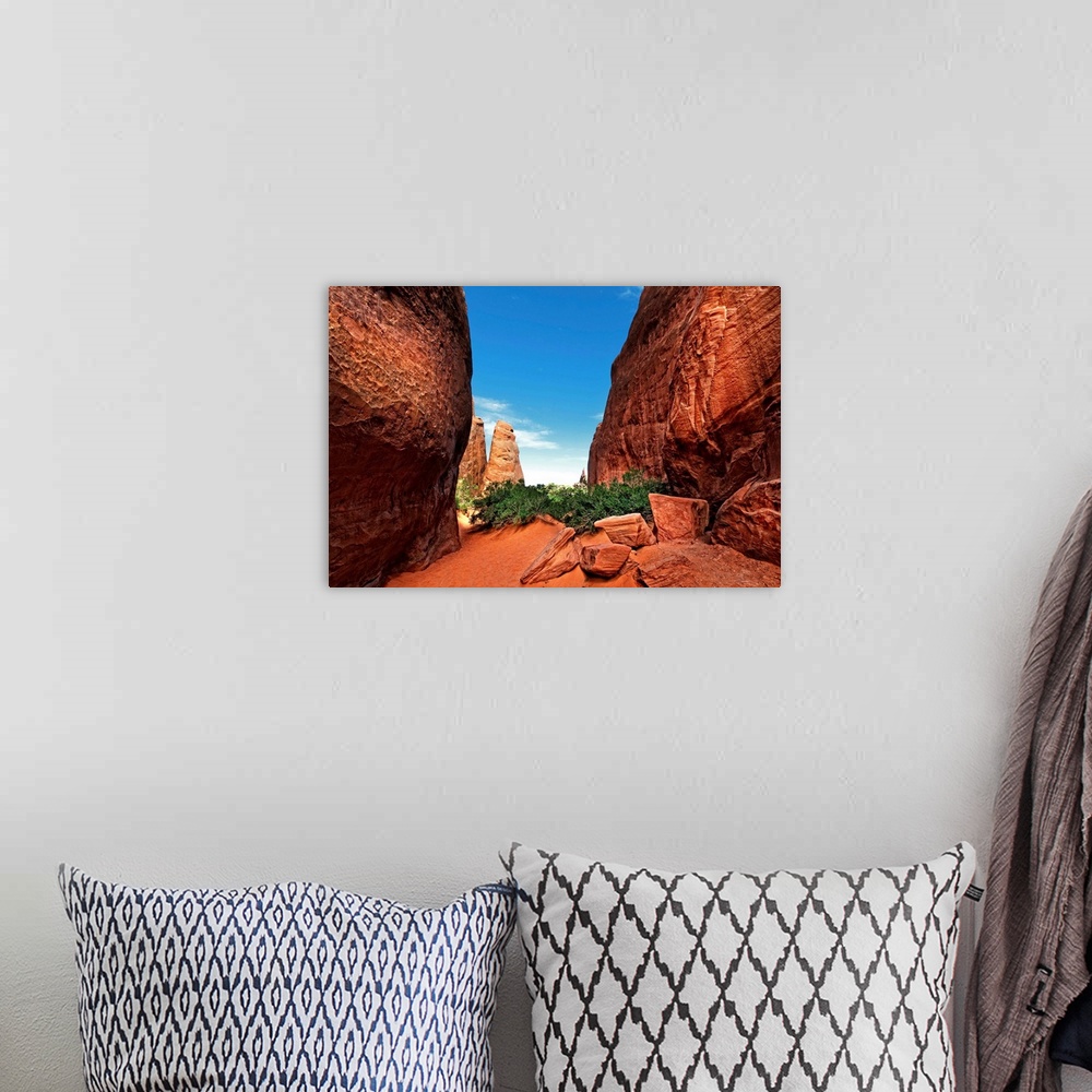 A bohemian room featuring Red Canyon with blue sky in summer