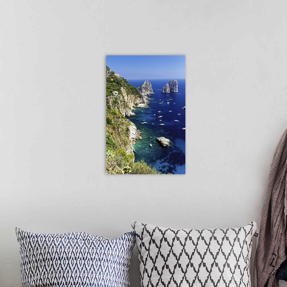 A bohemian room featuring Capri Coastline with the Rocks of Faraglioni, Campania, Italy.