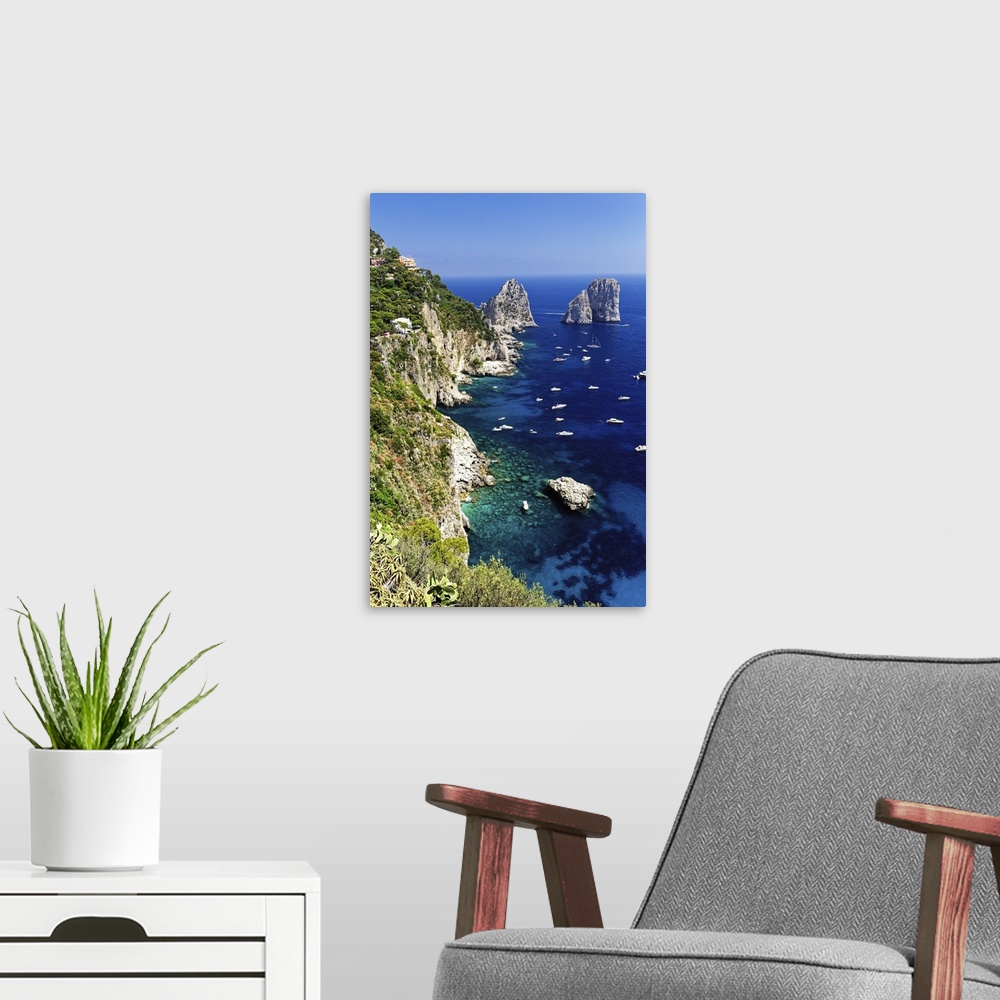 A modern room featuring Capri Coastline with the Rocks of Faraglioni, Campania, Italy.