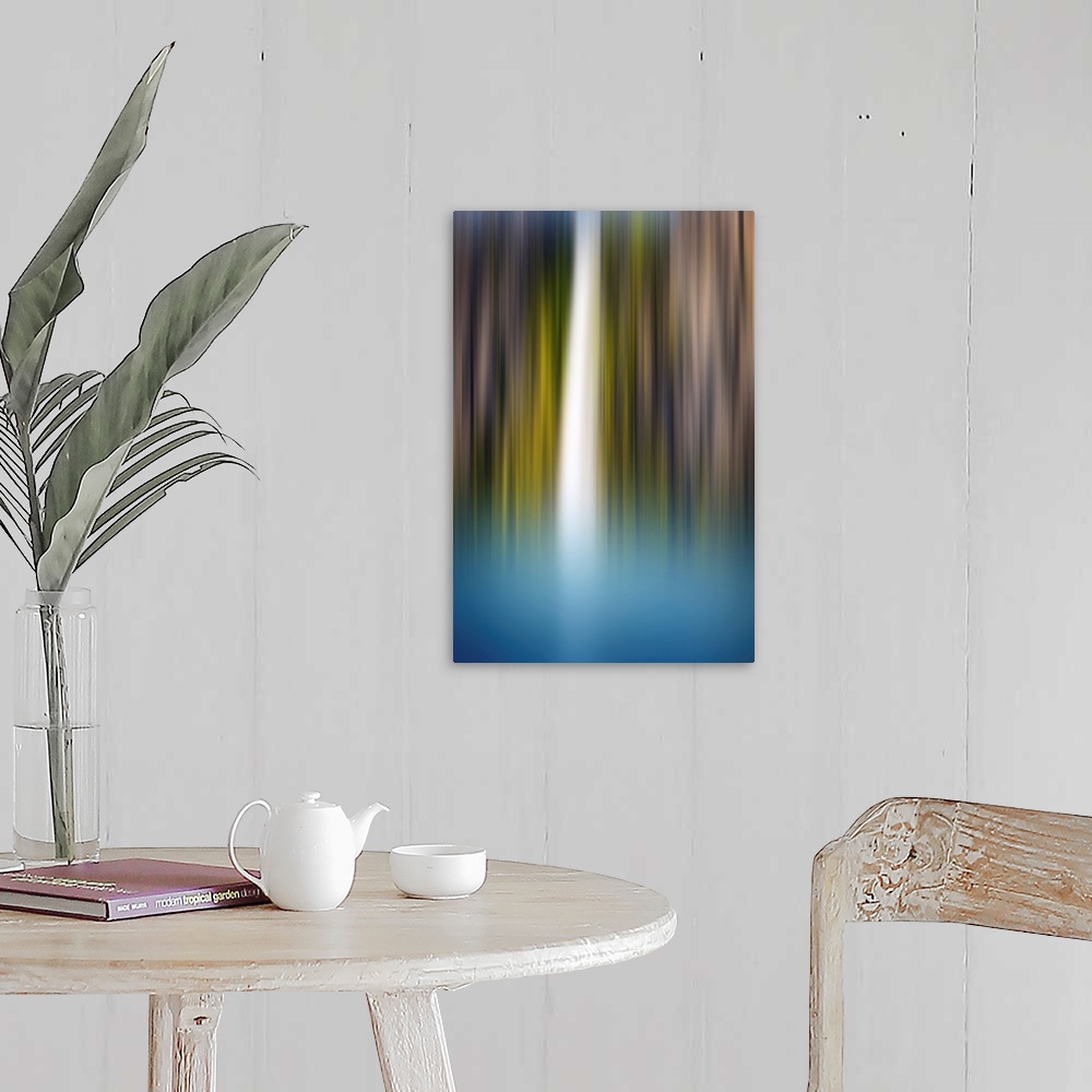A farmhouse room featuring Abstract photograph of a blurred waterfall with brown, green, blue, and white hues.