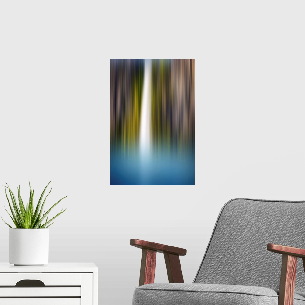 A modern room featuring Abstract photograph of a blurred waterfall with brown, green, blue, and white hues.