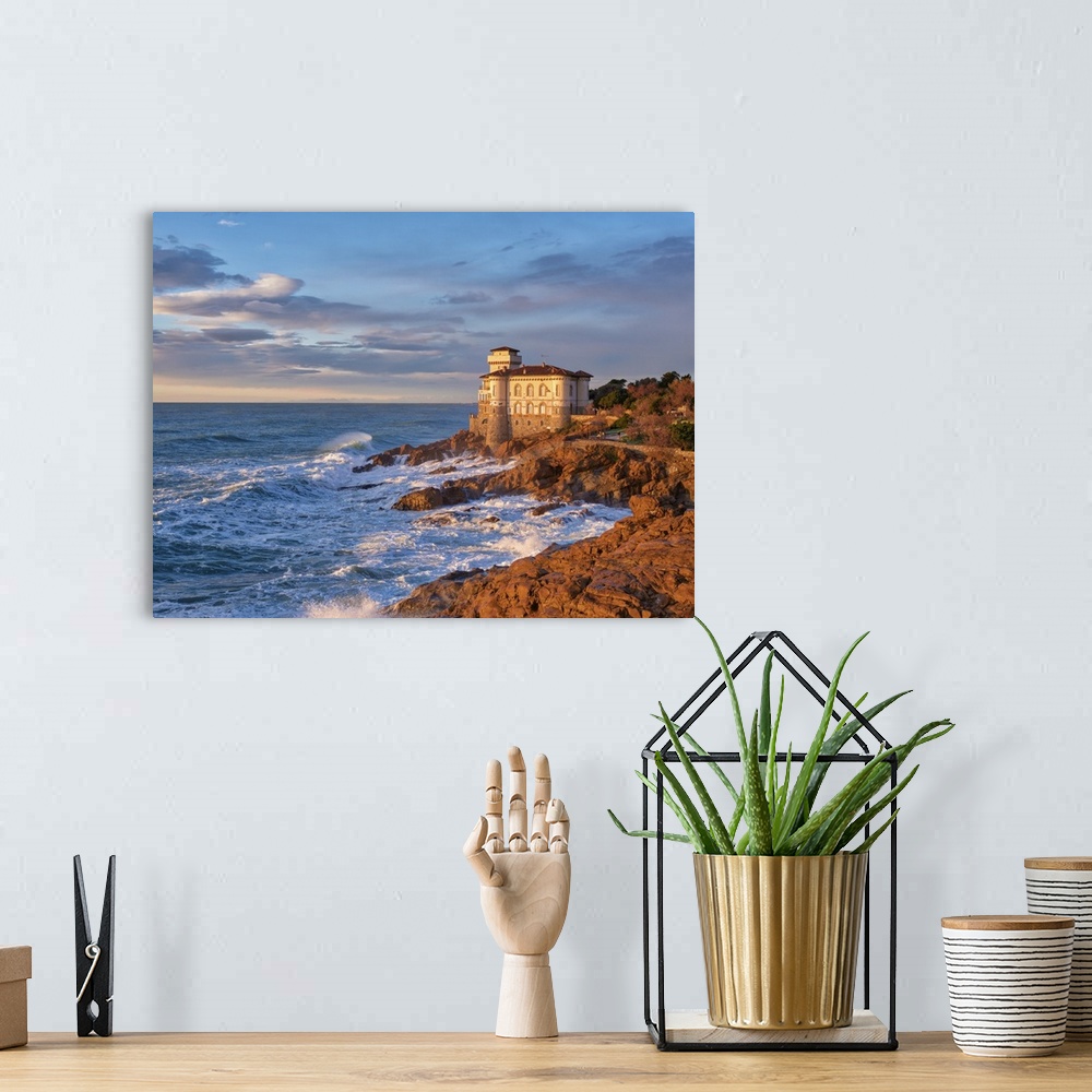 A bohemian room featuring This is the view from the sea of ??the Castello del Boccale in Livorno. It represents a watchtowe...