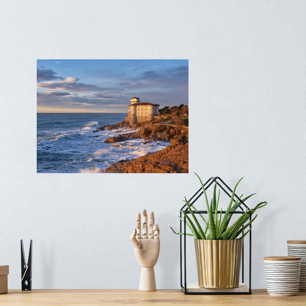 A bohemian room featuring This is the view from the sea of ??the Castello del Boccale in Livorno. It represents a watchtowe...