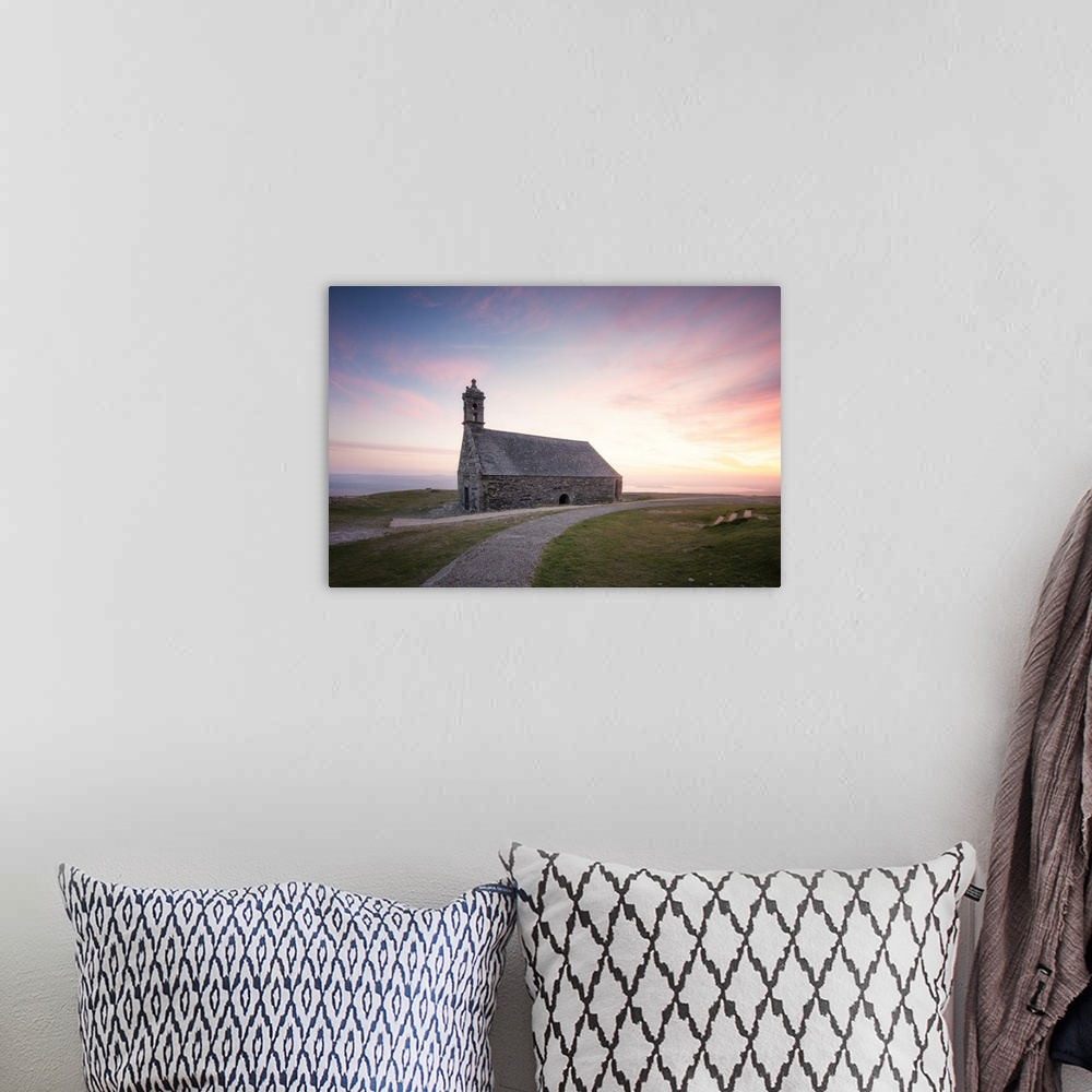 A bohemian room featuring Photograph of a gravel path leading to Chapelle Saint Michel De Brasparts in France at sunset.