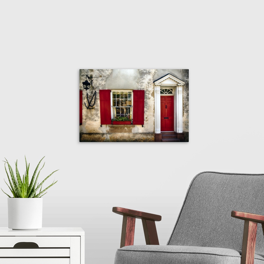A modern room featuring Entrance View of a Historic House in Charleston, with Bright Red Door