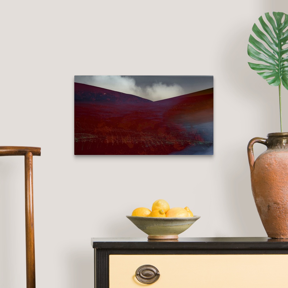 A traditional room featuring Photograph of an abstract landscape with rusted red hills and light trails, created with multiple...