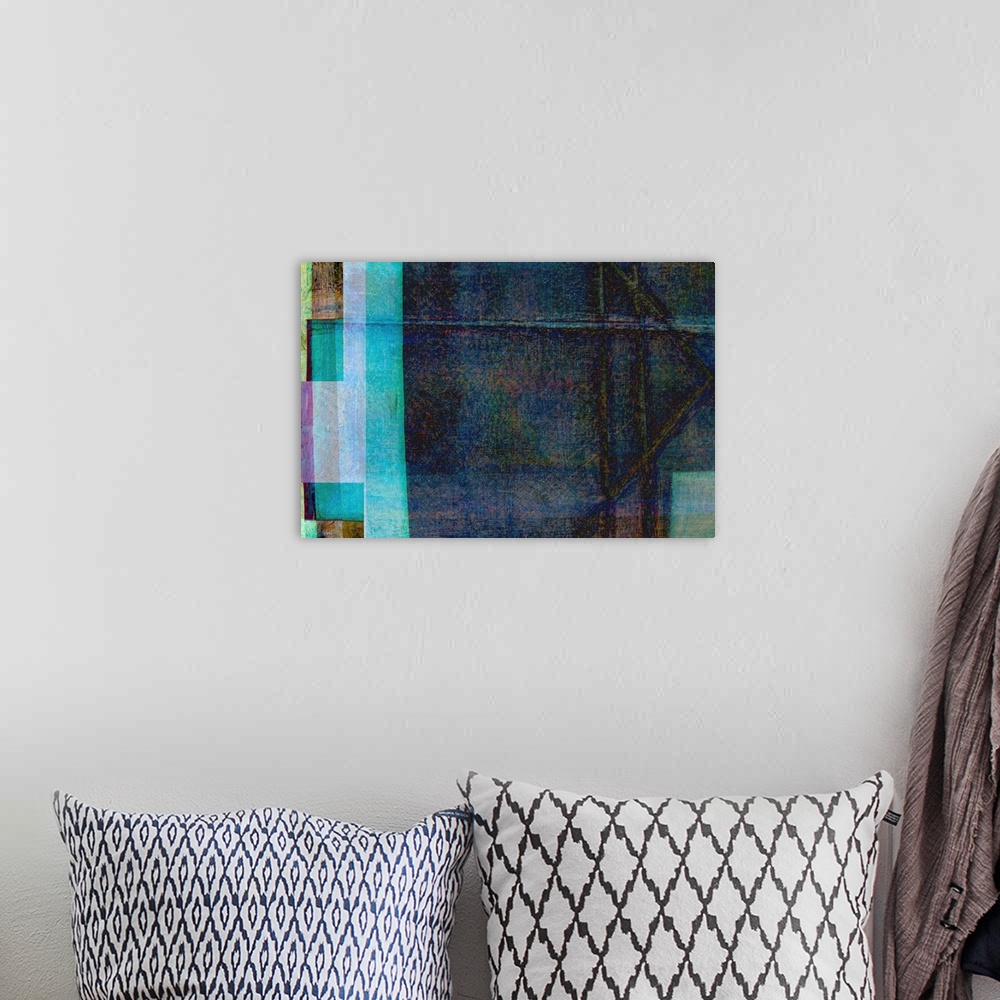 A bohemian room featuring A contemporary abstract of rectangular forms in shades of blue, turquoise and brown.