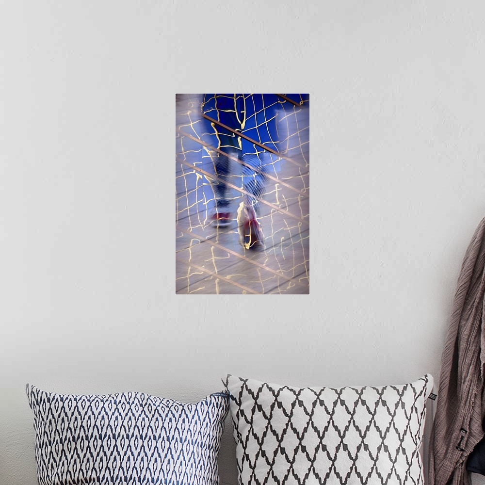 A bohemian room featuring Abstract image created by a reflection of a person walking in building windows.