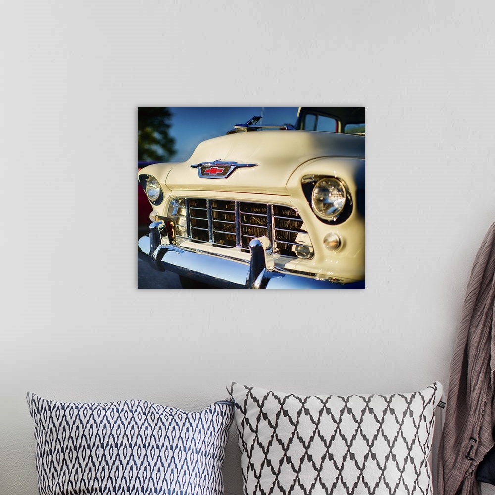 A bohemian room featuring A photograph of a vintage truck.
