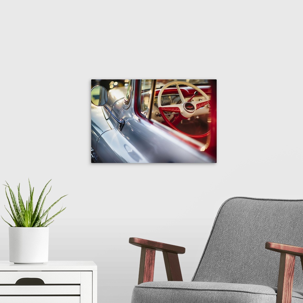 A modern room featuring A photograph of a vintage truck.
