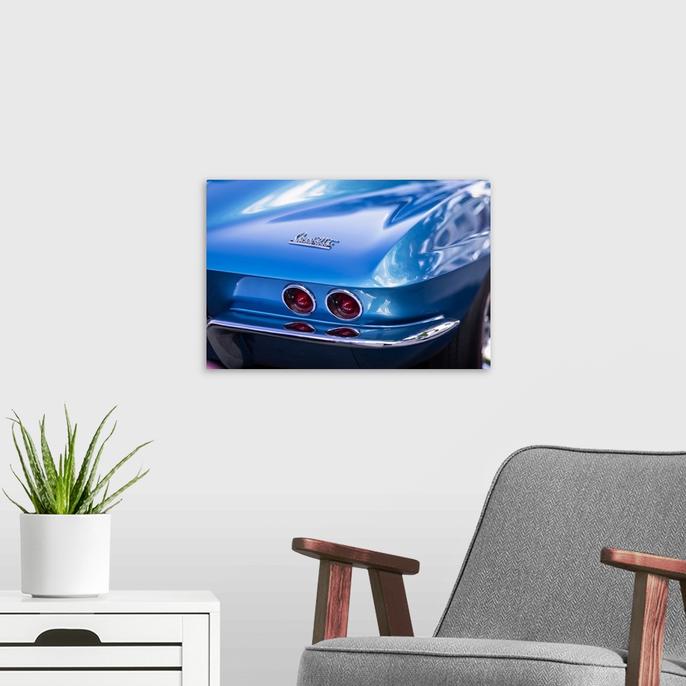 A modern room featuring Close Up  of the tail Lights of a 1967 Chevrolet Corvette Sting Ray Sports Coupe
