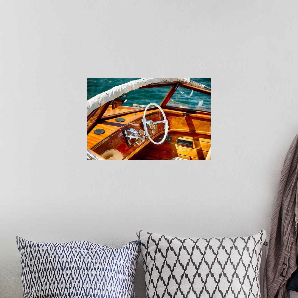 A bohemian room featuring Fine art photo of the polished wood dashboard of a motorboat.