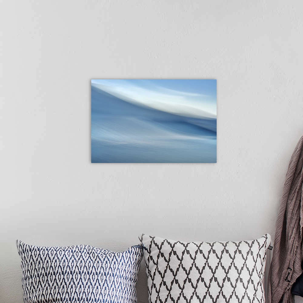 A bohemian room featuring Abstract image of a Pacific Northwest coastal view.